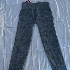 Blackish grayish leggings. Size Large